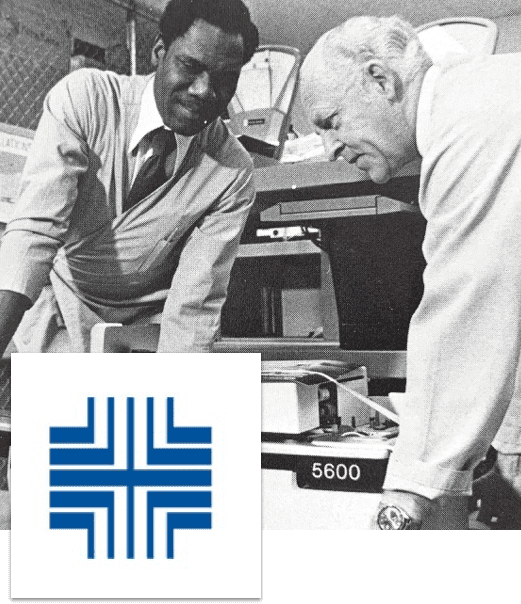 Image of 1971 Pitney Bowes logo update and employees working on 5600