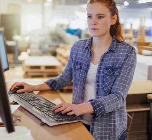 Image of employee working on a computer