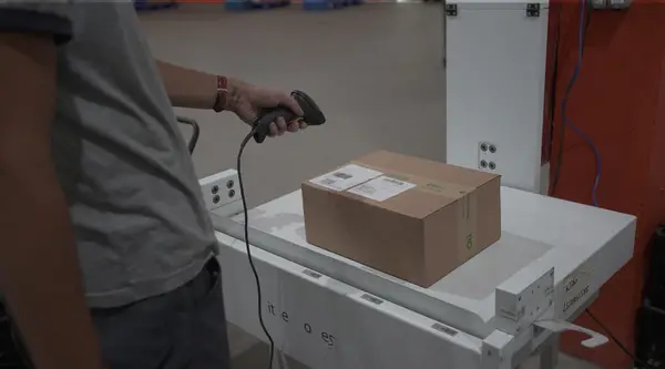 man scanning the parcel