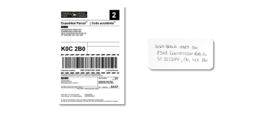 A printer shipping label with address information.