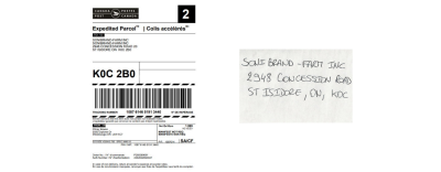 A printer shipping label with address information.