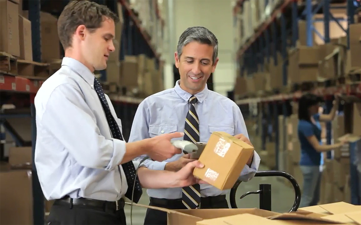 Person checking shipping box