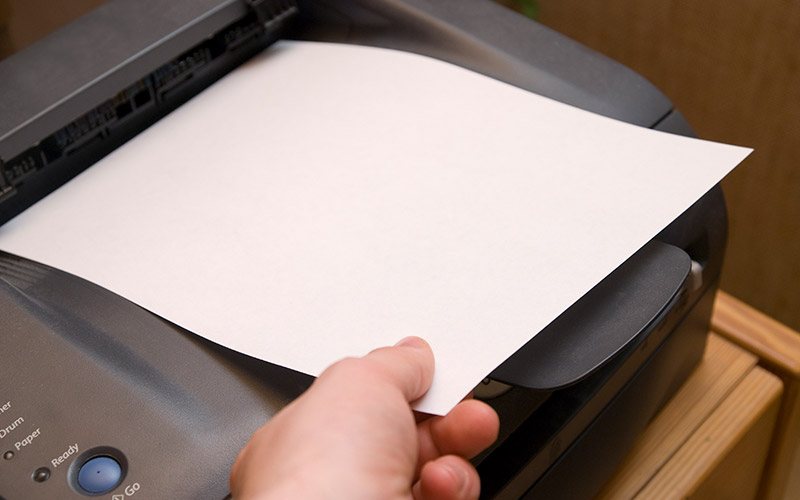 A person taking printout