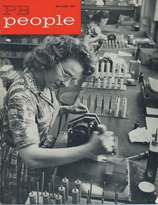 
Female employee repairing equipment