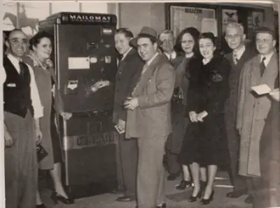 The "Mailomat" - a coin-operated postage meter and letter box opens new ways to send mail