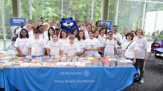 Pitney Bowes people standing and posing for a picture.