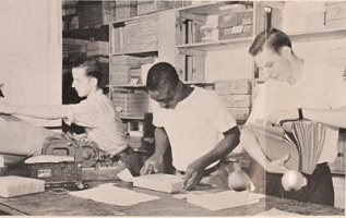Pitney Bowes employees in the mailroom
