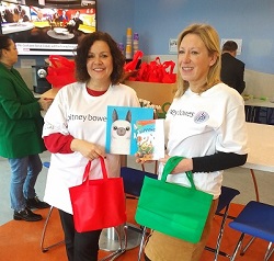 Pitney Bowes girls showing books