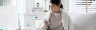 Girl holding medicines