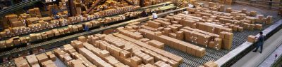 boxes sorted on conveyors in a warehouse