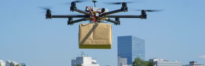 Drone carrying package