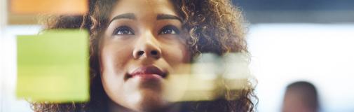 woman looking at notes-analytics