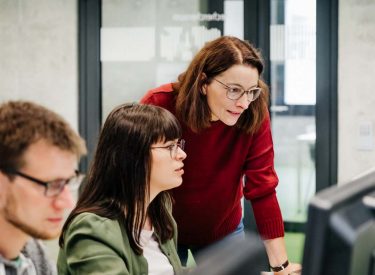 man and women working at office