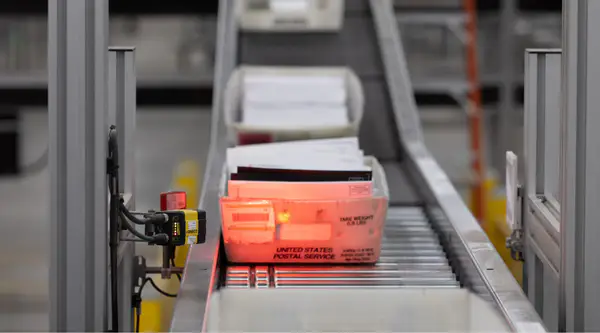 presorted mail on a conveyor belt