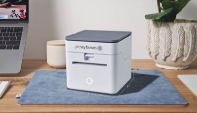 picture of PitneyShip Cube device with measurements 7in by 7in by 7in