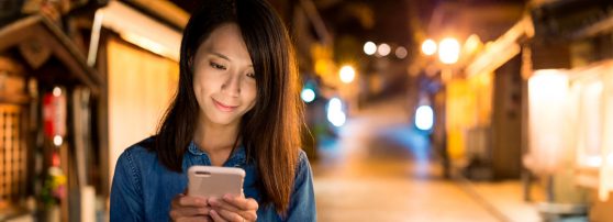 Lady looking at her cell phone