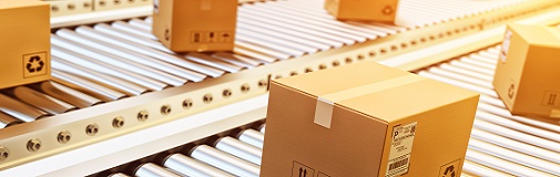 brown shipping boxes on conveyor belts