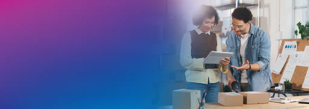 small business employees shipping packages with Pitney Bowes shipping solutions
