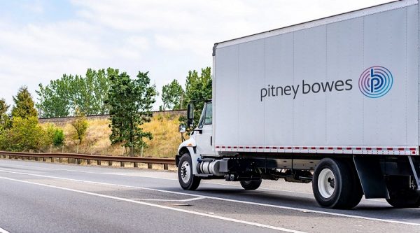Pitney Bowes branded truck on a road
