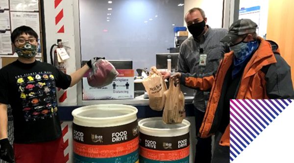 People donating to a foodbank