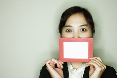 Girl holding envelope