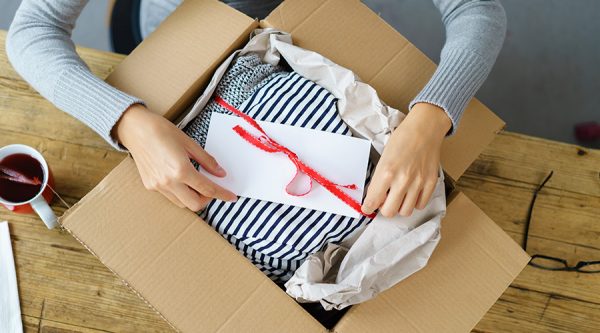 Women opening an branded order