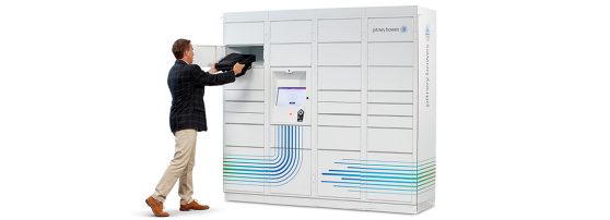 Man putting his bag in smart lockers