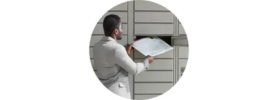 Man retrieving envelope