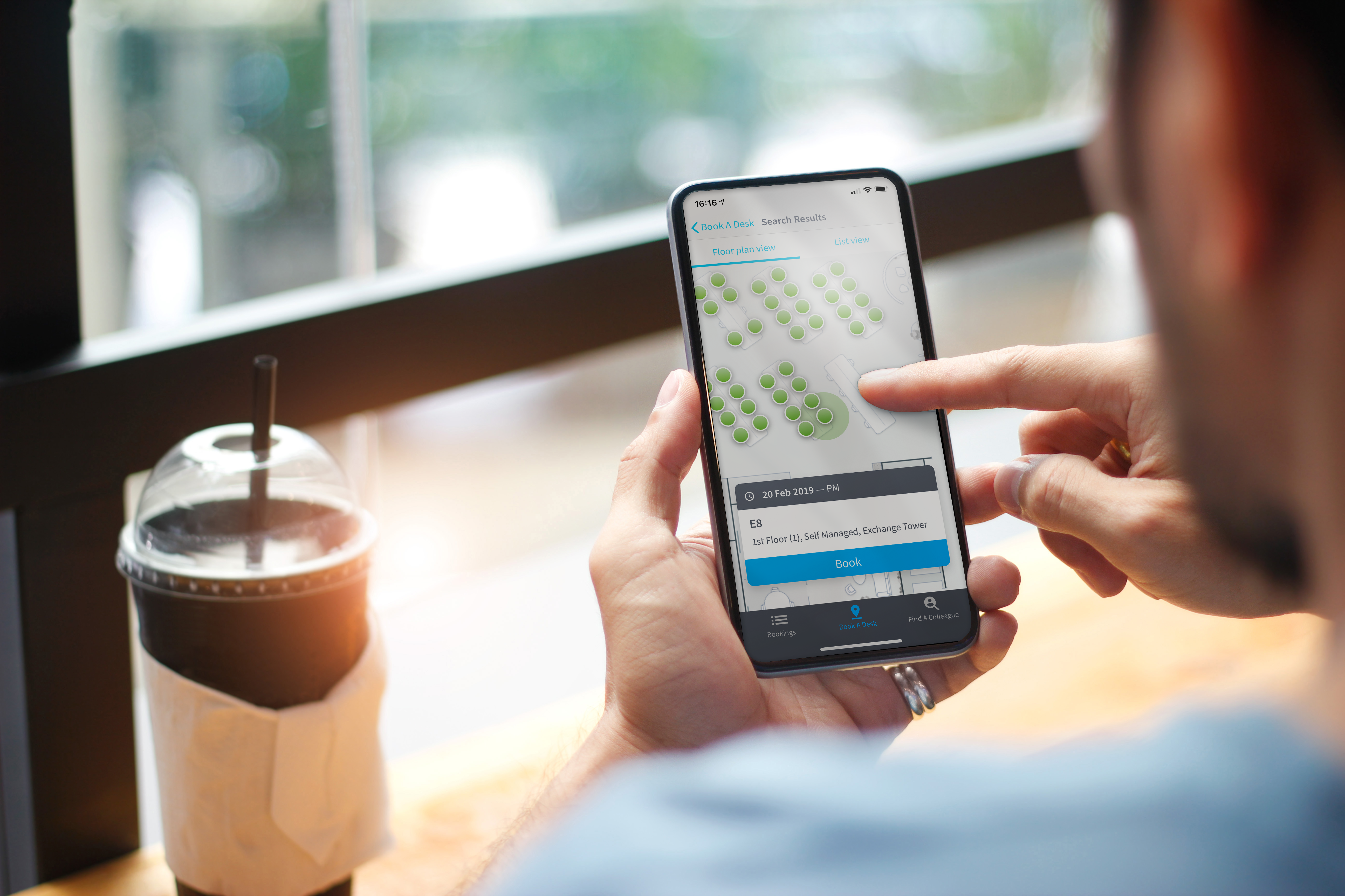 Man tapping on a touchscreen smartphone