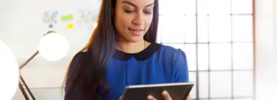 worker looking at a mobile device